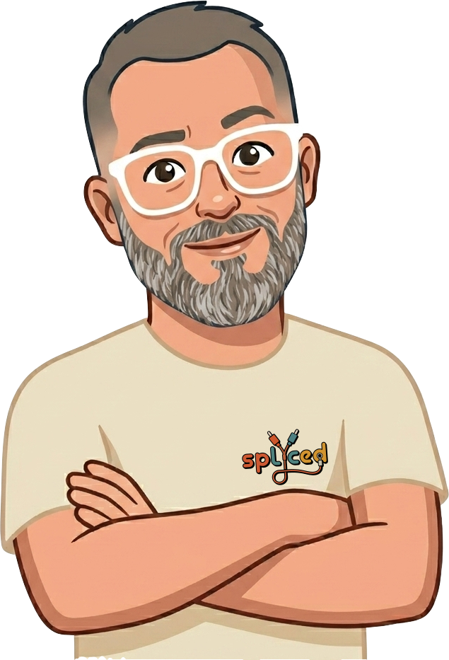 Illustrated mascot of the Splyced founder — a smiling AV designer with white glasses and a salt-and-pepper beard